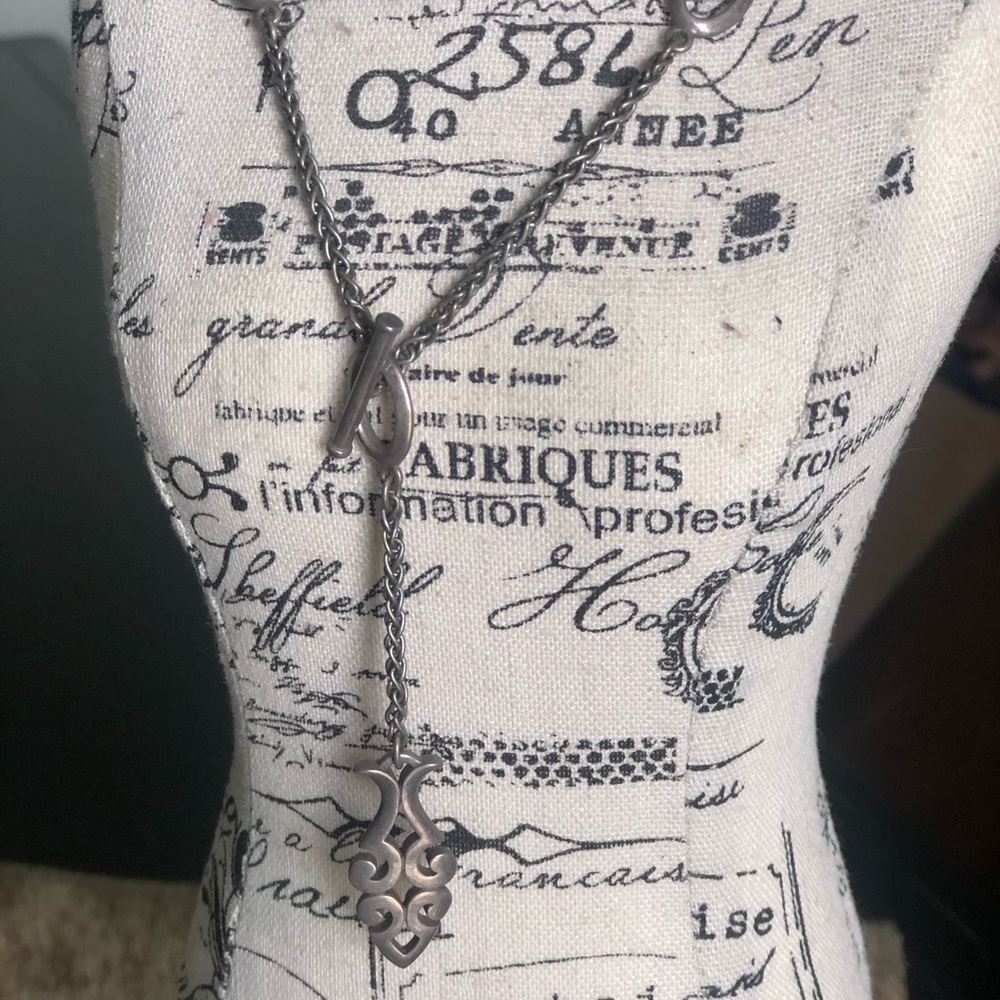 James Avery sterling silver scrolled ichthus.